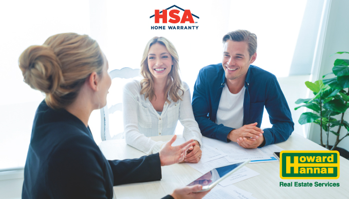 a couple discusses an hsa home warranty with a real estate professional